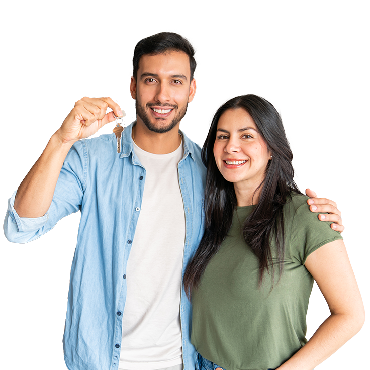 man holding new home key with his significant other